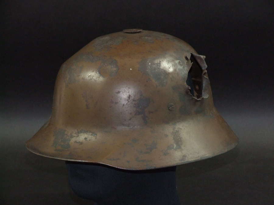 Battle damaged WW1 Berndorfer Helmet