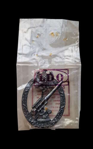 Army Flak Badge in LDO cellophane packet by Alois Rettenmaier.